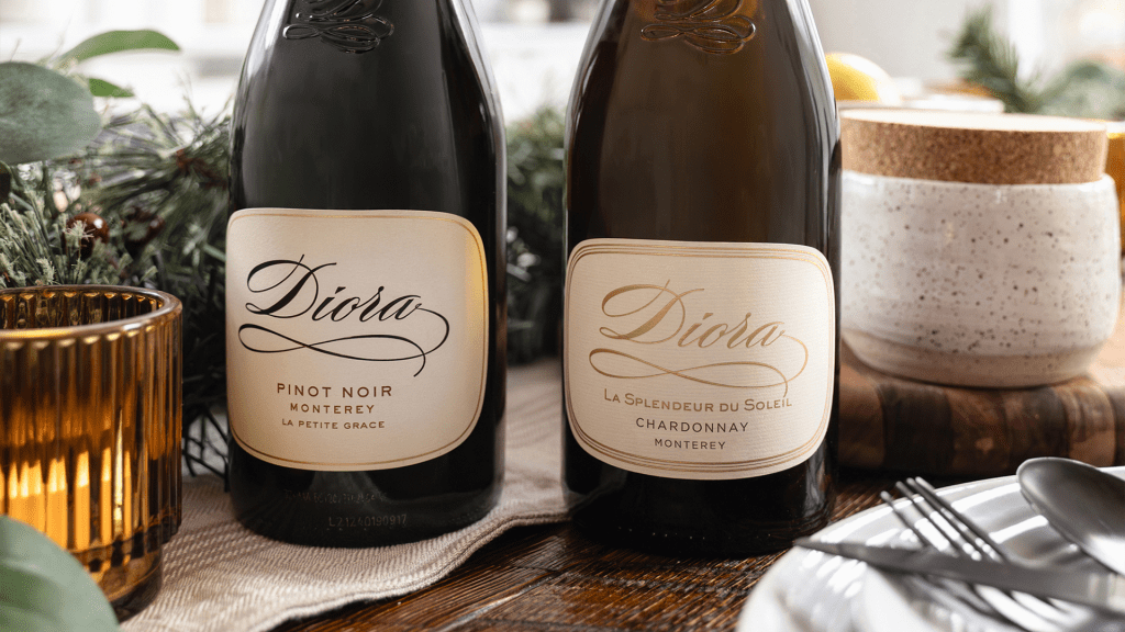 Close up photo of Diora Pinot Noir and Chardonnay on a decorated table